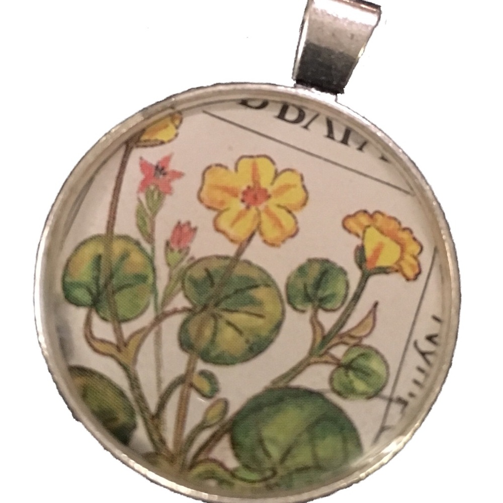 Flower necklace pendent made from vintage stamp